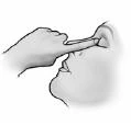 A hand with an index finger extended touches the inner ear of a person shown in profile during medication application