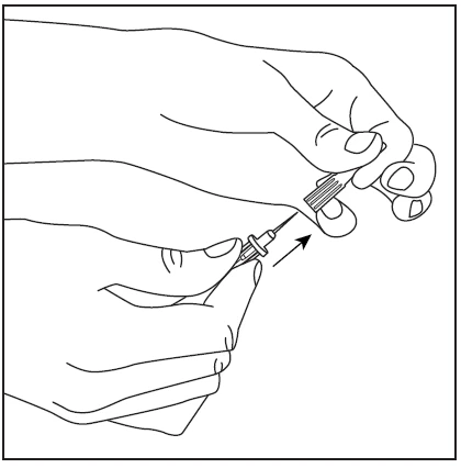 Two hands holding a syringe with needle, one hand stabilizing the barrel while the other applies or removes the protective cap indicated by an arrow