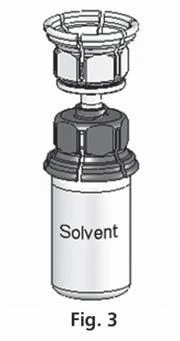 Schematic drawing of a medical device consisting of a white container labeled Solvent, a metal cap, and an upper component with a mesh