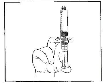 Hand holding a syringe vertically, showing a visible measuring scale and plunger inside, ready for drug administration