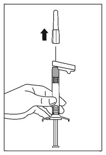 Hand holding a syringe with a black arrow indicating the motion of removing the upper part of the cap from the top end of the device