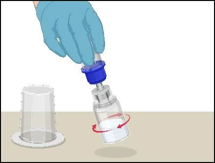 Hand in a blue glove holding a dispenser and performing a rotating motion over a transparent container with white liquid indicated by a red arrow