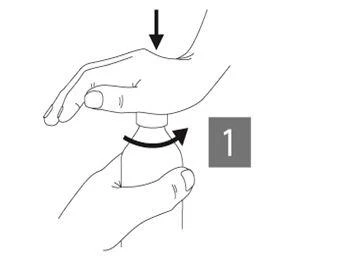 A hand presses the upper part of the device against the skin, while the other hand holds the base, and a black arrow indicates rotational movement of the component