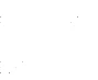 No visible elements in the image, white background with several small, irregularly scattered black dots and specks