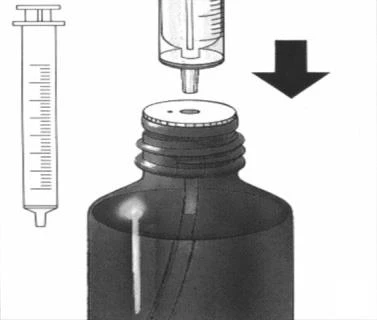 A syringe with needle positioned vertically above the opening of a medicine vial, indicated by a black arrow suggesting downward movement to withdraw the medication