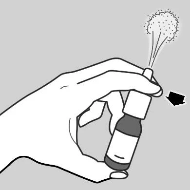 A hand holding a small bottle with an atomizer emitting a sprayed mist, with a black arrow visible next to it indicating the direction of movement