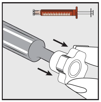 Hands unscrewing a white cap from a medication vial, with a syringe filled with brown liquid and a milliliter scale placed horizontally above it