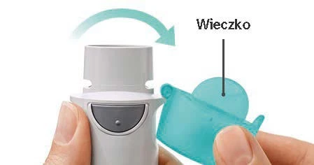 A hand removing a blue cap from a white medical device, indicating the direction of motion at an angle with an arrow