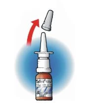 A hand lifting a white cap off a nasal spray bottle, indicating the motion of removing a component, against a light blue background
