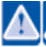 Triangolo di avvertimento bianco con punto esclamativo nero posizionato su sfondo blu, utilizzato come simbolo di attenzione o avvertimento