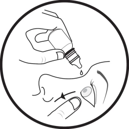 Hand holding a small bottle with a dropper, dispensing a drop of medication directly into the eye of a person shown in profile view
