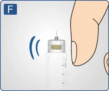 Close-up of a white vial with a needle and a hand finger on a light background, with a blue letter 'F' symbol in the upper left corner