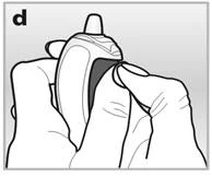 Hand holding an inhaler, fingers pressing the dosing mechanism to release a dose of medication