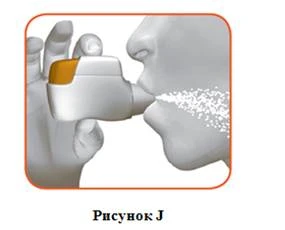 Рука тримає інгалятор, який випускає аерозоль у відкритий рот людини для вдихання лікувального препарату