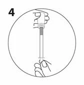 A hand holds the syringe vertically, the other hand supports its base, preparing for injection