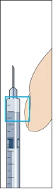 Syringe with needle inserted at an angle into the skin, showing volume scale and a blue square marking solution level