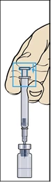 Hand holding a syringe, inserting the needle into an ampoule to draw solution, showing visible liquid level and syringe scale markings