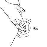 Hand massaging the skin on the thigh, preparing the site for injection