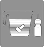 A plastic cup containing liquid with a pipette inside, placed next to a vial with a dropper for medication dosing