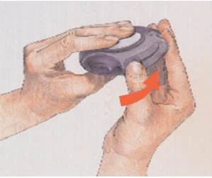 Hands holding an inhaler, finger pressing the button, with a red arrow indicating the direction of pressing to release a dose of medication