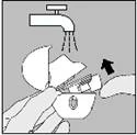 Hand holding an open blister pack under a stream of water from a tap, the other hand removing a tablet, arrow indicating the direction of action
