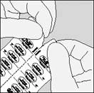 Hands removing a tablet from a blister pack, fingers pressing from below the packaging to push the medication out
