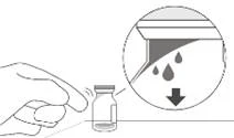 Hand holding an ampoule with liquid; a close-up view on the side shows drops falling from a glass container