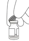 Hand opening the cap of a medication ampoule, preparing it for use in medical purposes