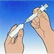 Hands holding a syringe and a vial, inserting the needle into the vial to draw up the solution prior to injection